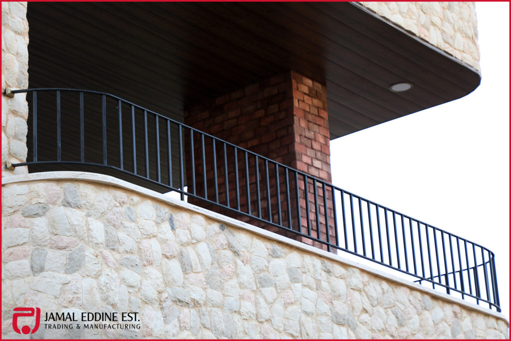 wrought steel hand rails and side rails installed on a porch in black color