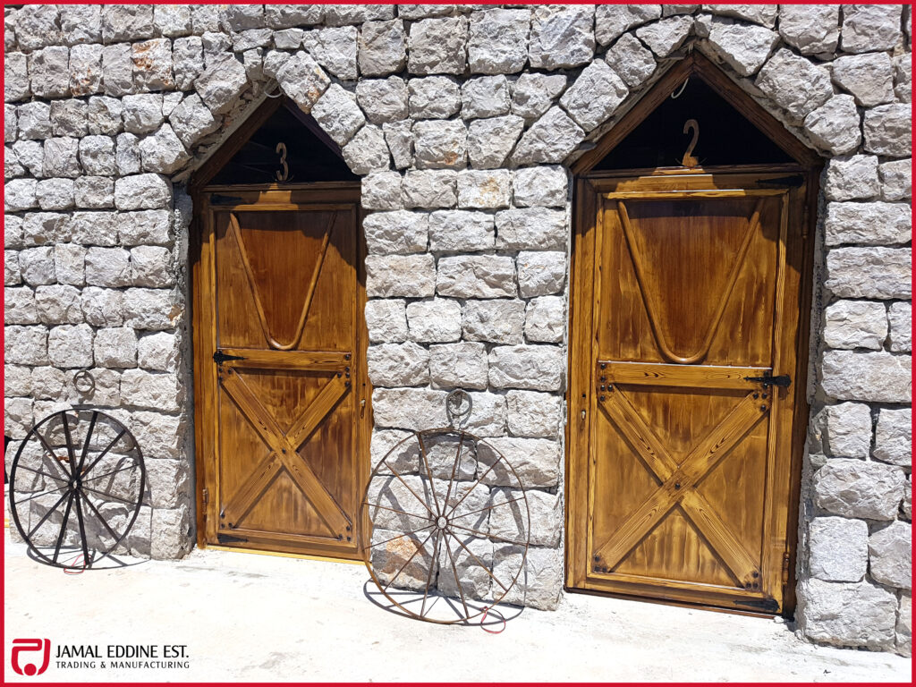 wooden door design with wrought steel ferfoje railings and handle